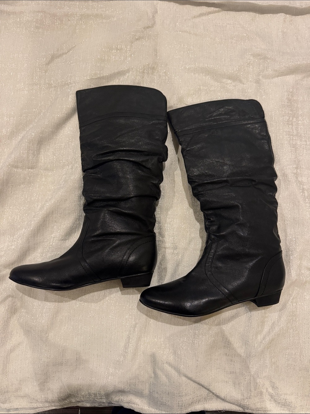 Sleek Black Slouch Knee-High Heeled Boots